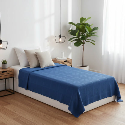 blauwe plaid van 100% katoen op een eenpersoons