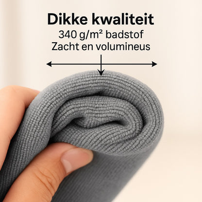 Detail van dikke badstof microvezeldoekjes in antraciet - duurzame kwaliteit met hoog absorptievermogen - Beterkatoen