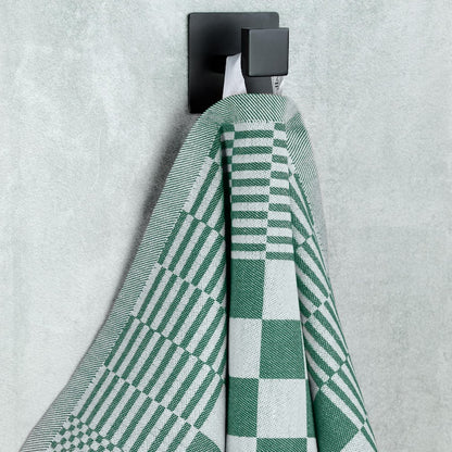 Detail van ophanglus van groene theedoek - sterk afgewerkt voor dagelijks gebruik in horeca - Beterkatoen